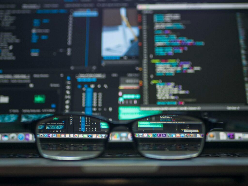 AI SOC alert volume Crogl https://www.pexels.com/photo/data-codes-through-eyeglasses-577585/