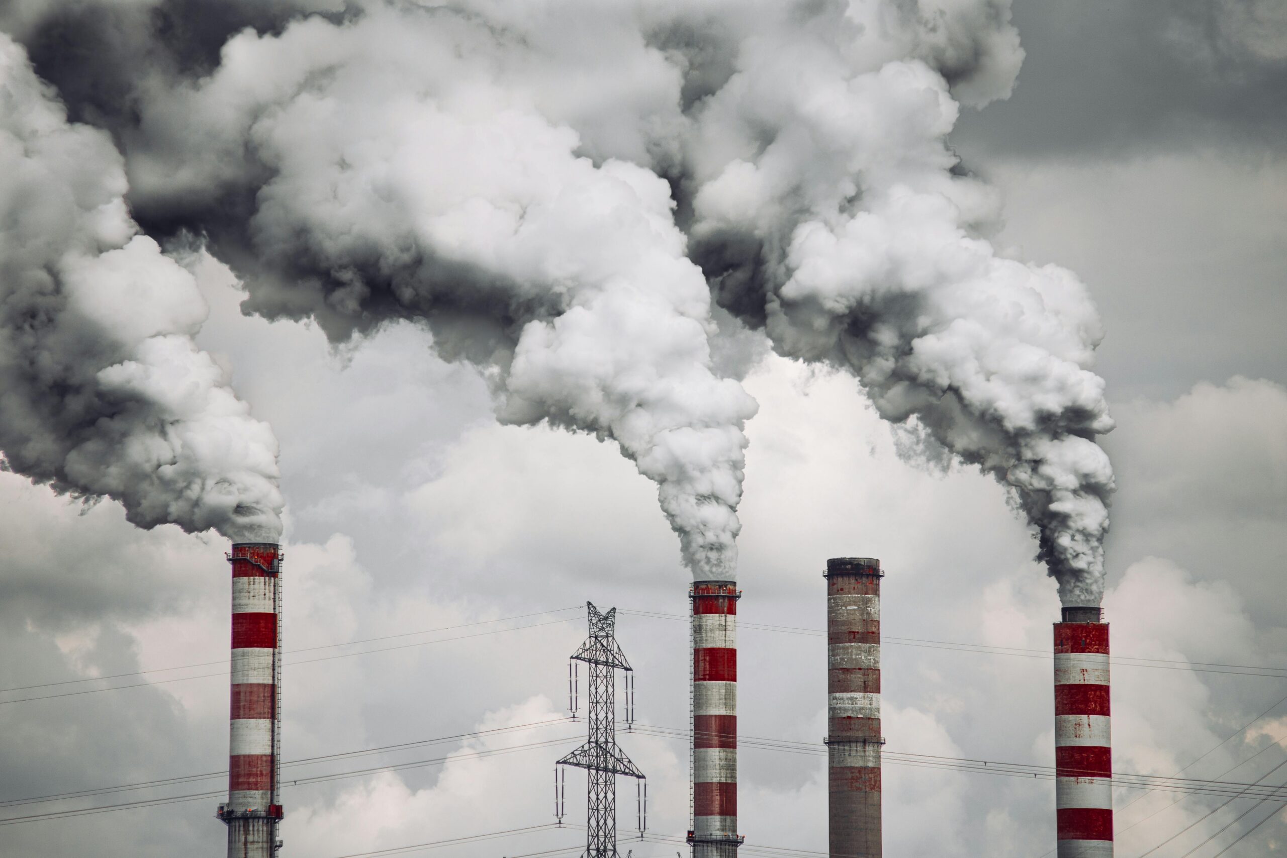 supply chain emissions https://www.pexels.com/photo/smoke-from-chimneys-in-factory-19419368/