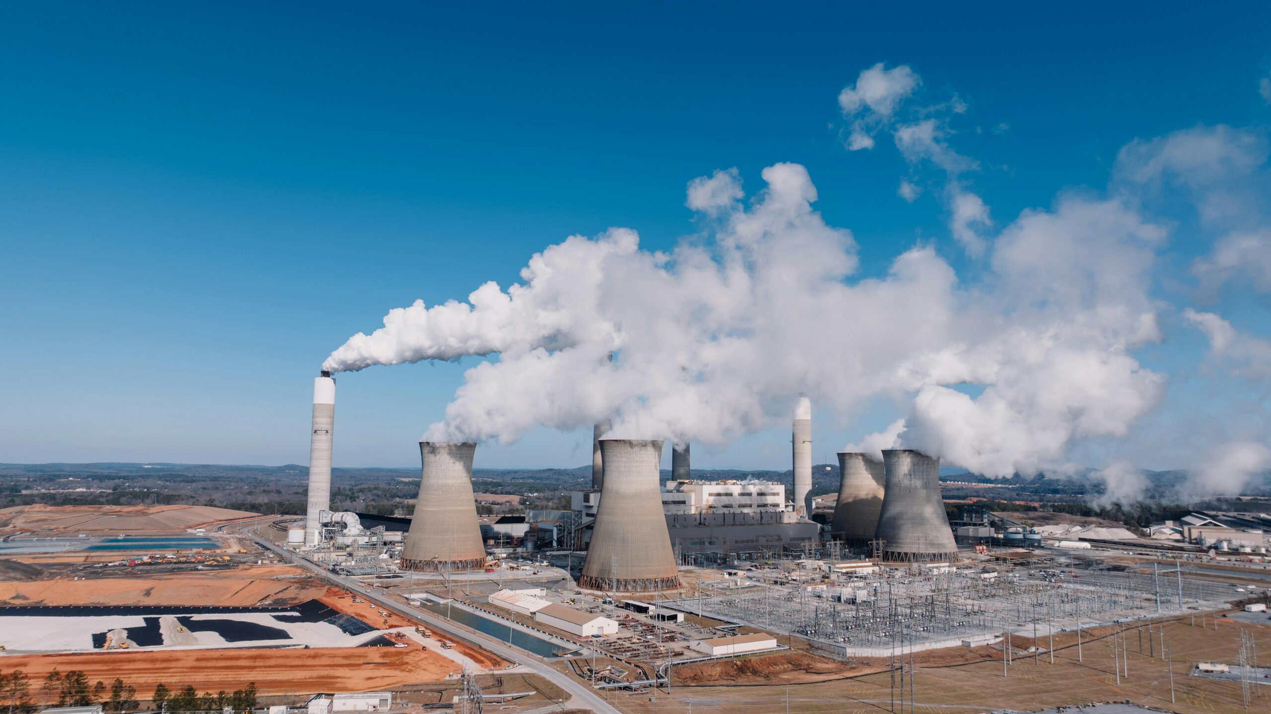 energy design energy intelligence https://www.pexels.com/photo/smoke-from-factory-chimneys-19938251/