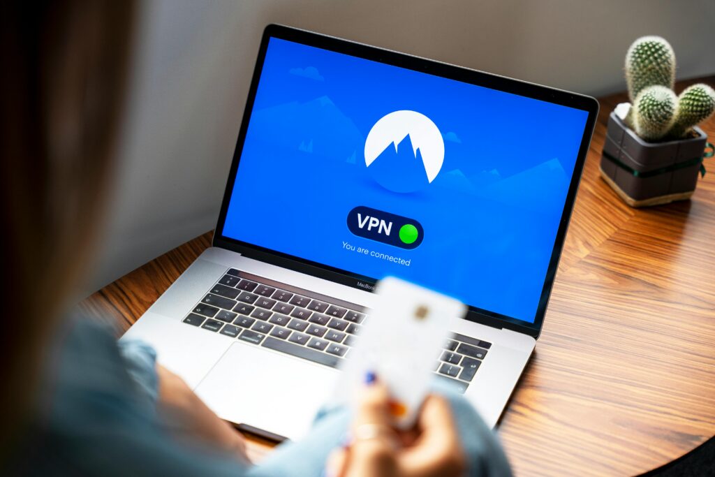 CrowdStrike NordVPN https://www.pexels.com/photo/macbook-pro-on-brown-wooden-table-5243610/