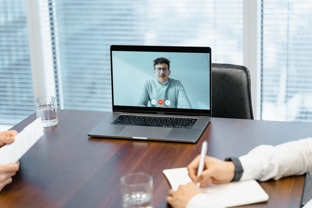 909Shield proxy interview AI fraud https://www.pexels.com/photo/a-businessman-in-an-online-meeting-7643731/