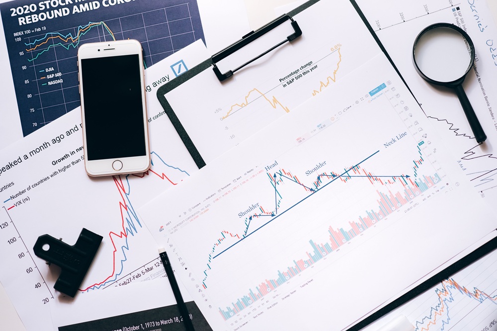 multi-source market research https://www.pexels.com/photo/silver-iphone-6-on-clipboard-with-statistical-data-5561923/