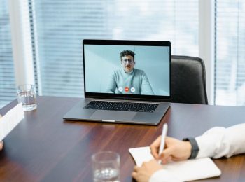 909Shield proxy interview AI fraud https://www.pexels.com/photo/a-businessman-in-an-online-meeting-7643731/