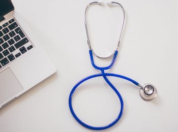 agentic AI healthcare ransomware https://www.pexels.com/photo/computer-desk-laptop-stethoscope-48604/