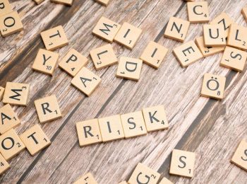 HITRUST risk IRIDEX https://www.pexels.com/photo/scrabble-letters-spelling-risk-on-a-wooden-table-19856611/