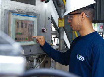 Illumio IT OT https://www.pexels.com/photo/industrial-worker-operating-control-panel-37769416/